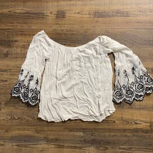 Off the shoulder white and black blouse